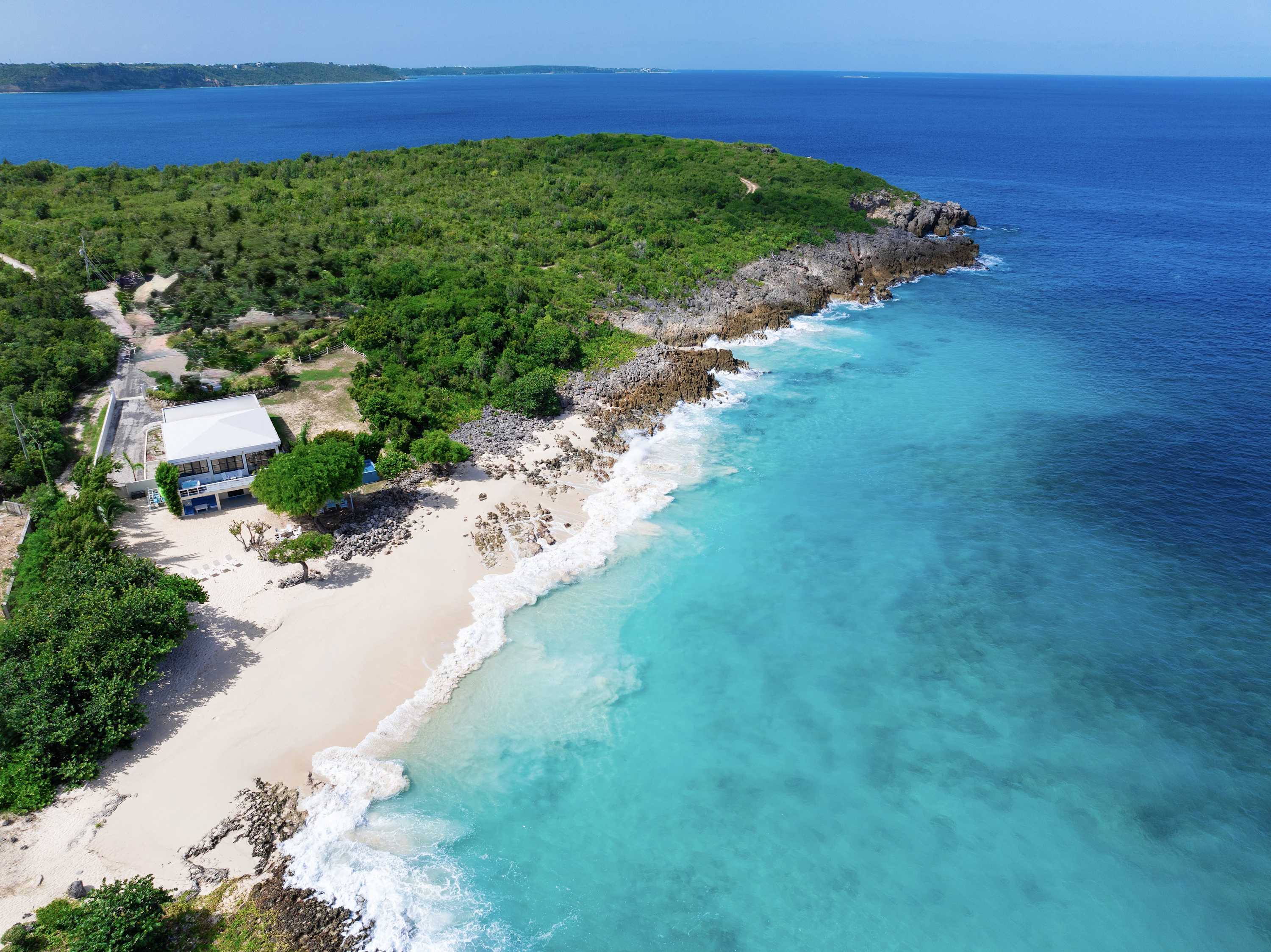 Seashell Beach House, Beachfront Limestone Bay Villa with Pool, Jacuzzi and Four King Suites Main View