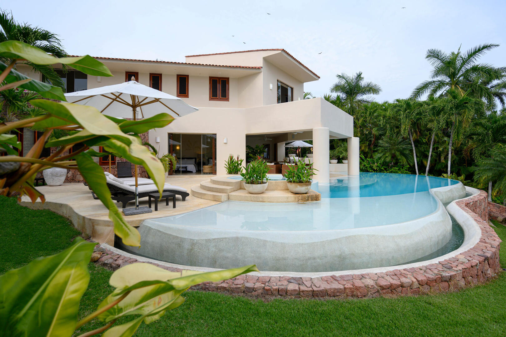 Villa Alamanda, a Lagos del Mar Estate with Whitewater Views and an 85-Foot Infinity Pool - Photo 30