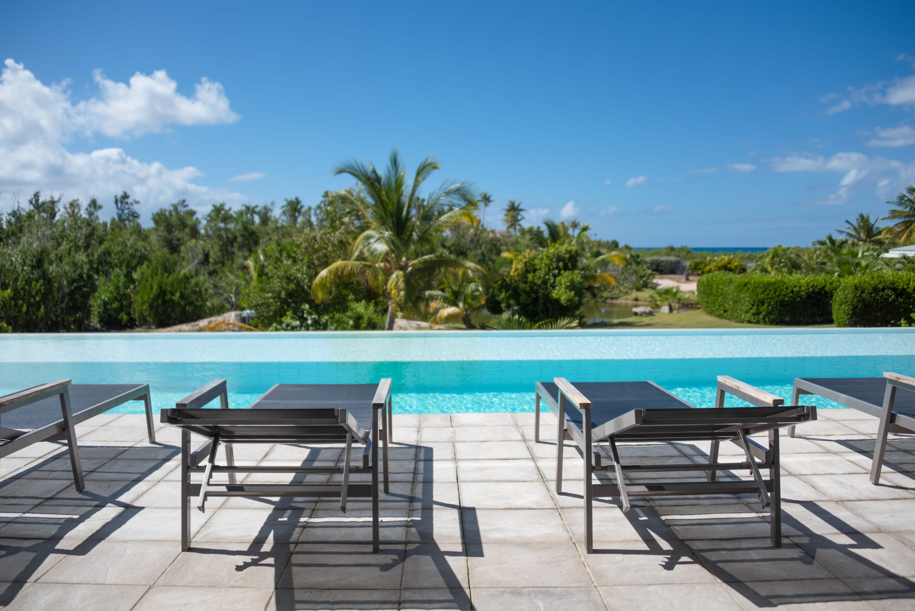 Villa Palm Bay, a Sleek Sea View Retreat in Terres Basses - Photo 6